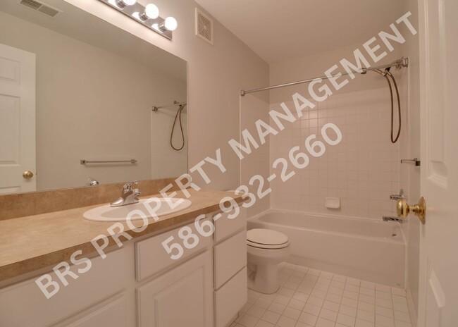 Building Photo - Move-In Ready 2BR Condo with Covered Garage in Harrison Township