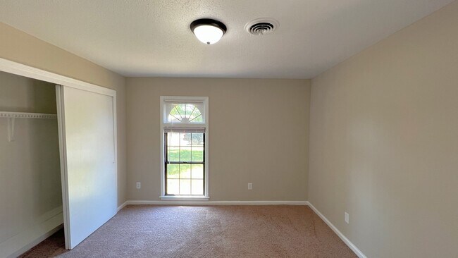 Building Photo - Beautiful 4-bedroom brick home