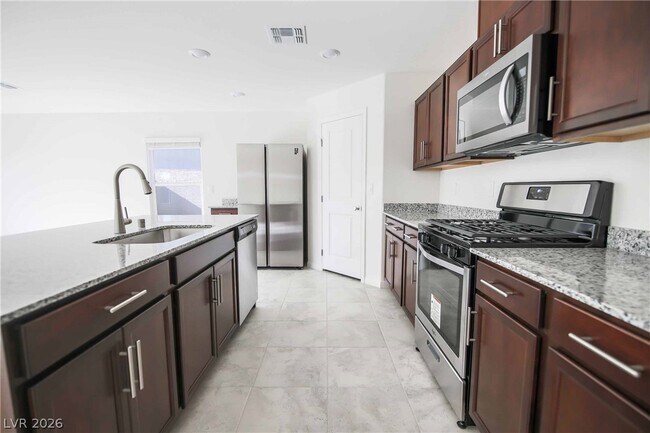 Building Photo - 7087 Baza Ave