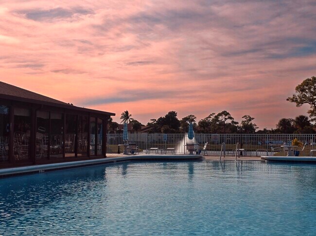 Building Photo - 5960 Whispering Pine Way