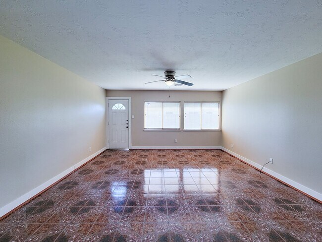 Building Photo - 3 bedroom one story home on large corner lot. Home has hard flooring throughout living areas and ...