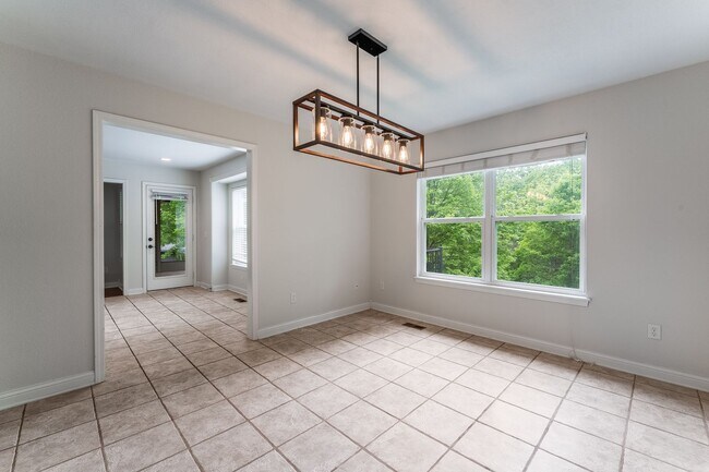 Building Photo - Spacious Bella Vista Retreat with Sunlit Interiors & Outdoor Oasis