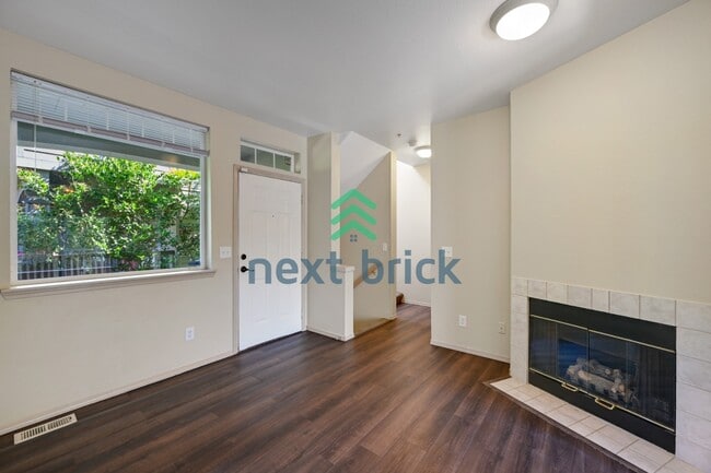 Building Photo - Spacious 3-Level Condo with 2-Car Garage, Mt. Rainier Views & Turnkey Comfort in Bonney Lake