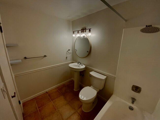 Building Photo - 1,300+ Sq Ft 2BR Condo w/ Parking, W/D & Utilities Included | $1,000 Move-In Credit