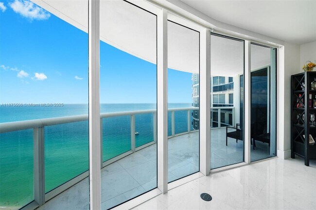 Building Photo - 17201 Collins Ave