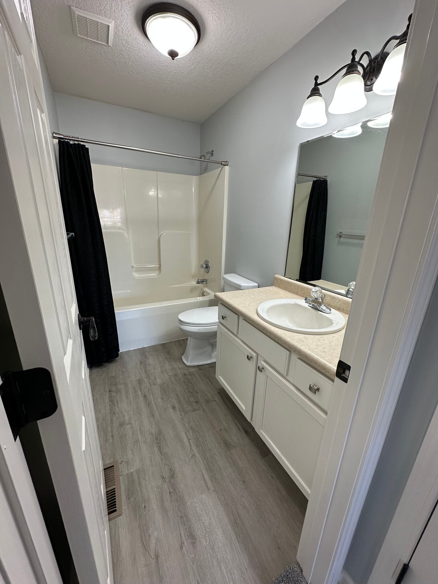 Full Bath Upstairs (Guest Bathroom) - 411 Treeline Cv