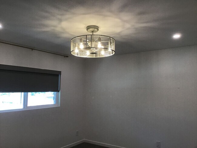 Building Photo - Corner Unit Townhome with Style and Substa...