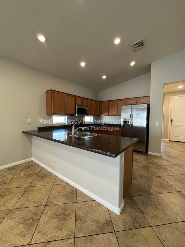 Building Photo - 13014 W Lamar Rd