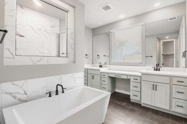 Building Photo - ASK ABOUT FREE APPLICATIONS THROUGH AUGUST!  "Spacious 4-Bedroom Sanctuary with Cozy Fireplace in...