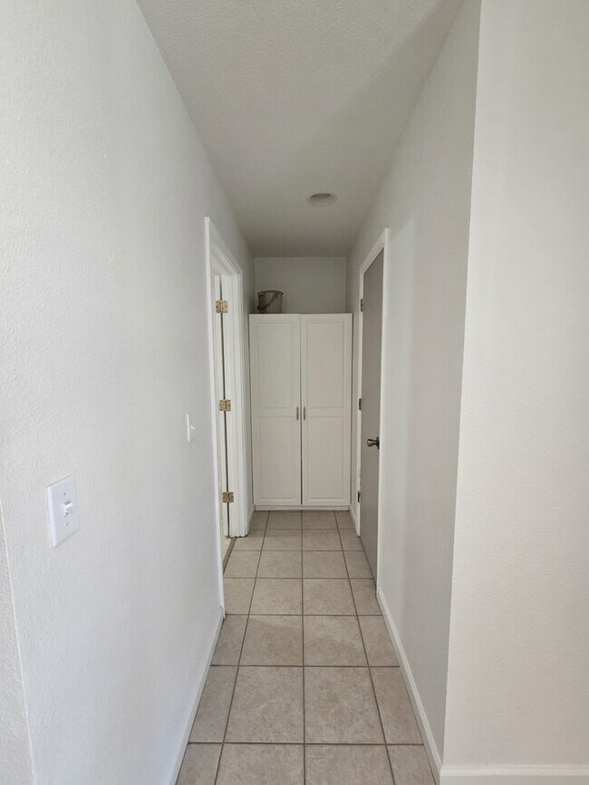 Building Photo - Spacious 4-Bedroom Home with Solar, Finished Garage, Large Pantry & Low-Maintenance Backyard in M...