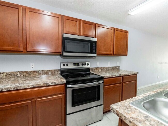 Building Photo - 5555 Maggiore Blvd