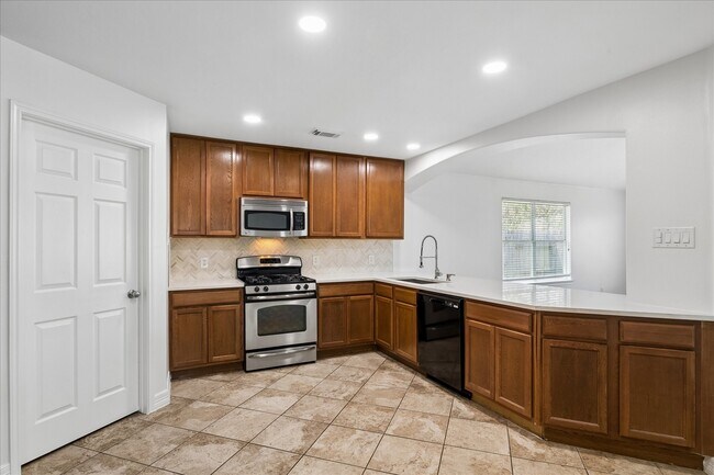 Building Photo - 8310 Hardy Elm St