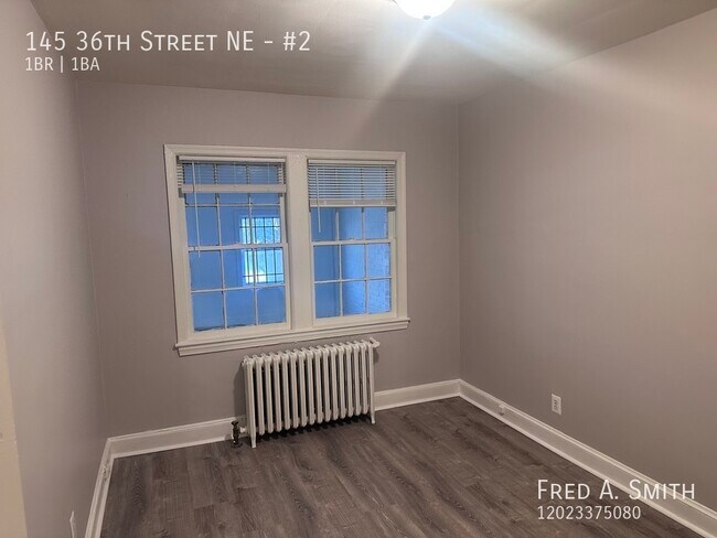 Building Photo - 145 36th St NE