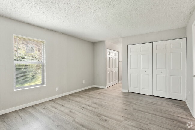 3BR, 2BA - 1194SF - Primary Bedroom - Kensington Manor Apartments
