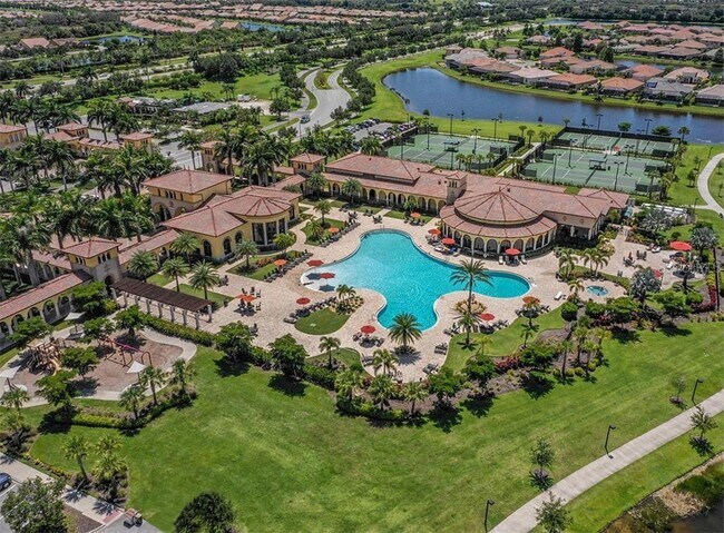 Building Photo - "Spacious 3-Bedroom Townhouse with Lake Views & Modern Finishes in Gran Paradiso"