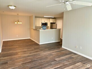 Building Photo - Modern 3-Bed Condo: Lovely Appliances, LVP...