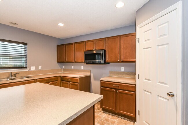Building Photo - 7472 Mishkie Dr