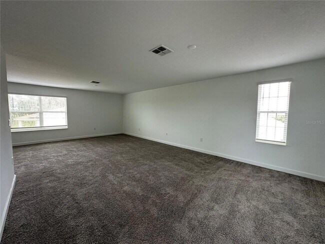 Building Photo - 8855 Fallen Oak Dr