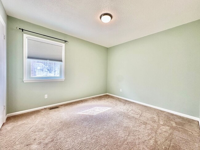 Building Photo - Updated 3BR Ranch | Large Lot, Deck & Modern Finishes – Minutes to Durham