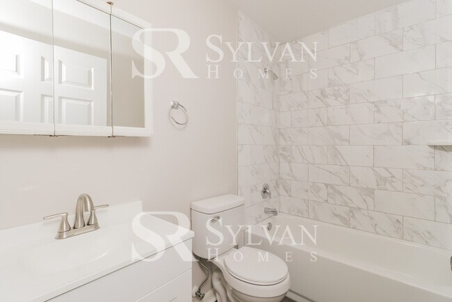 Building Photo - This charming home is ready for your personal touch!