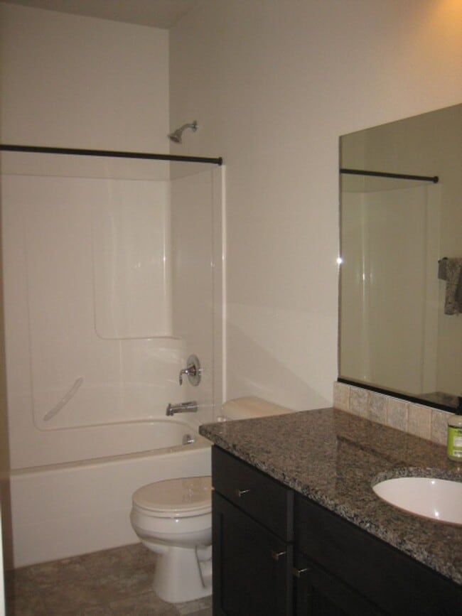 Building Photo - CDA Home w/ 22X45 RV Garage/Shop!