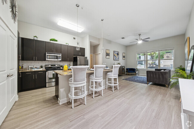 Modern Kitchen and Dining Room at Addison Keller Springs Apartments in Addison, TX - Addison Keller Springs