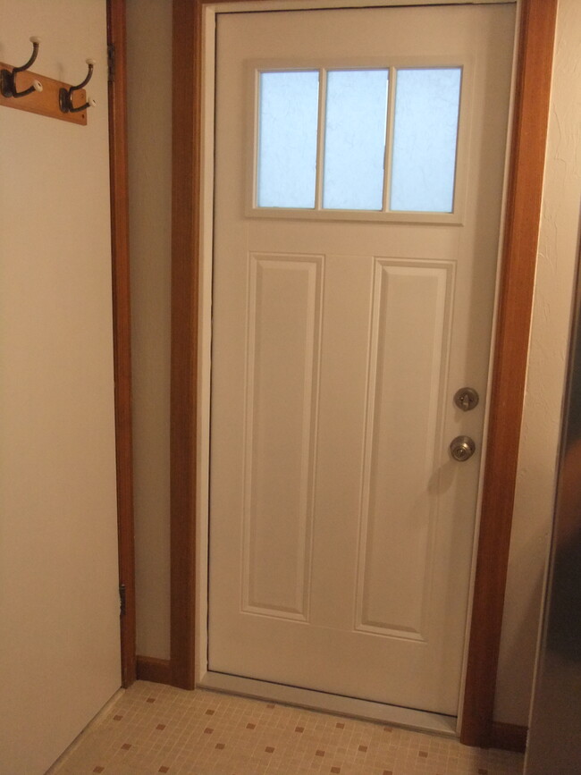 Master bath door to the pool - 47 Sea Island Dr N