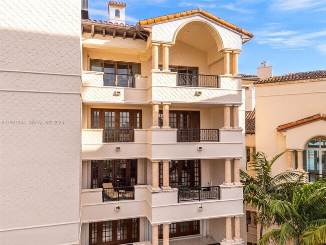 Building Photo - 7471 Fisher Island Dr