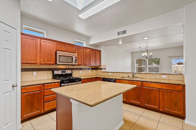 Building Photo - "Spacious 4-Bed Oasis with Granite Touches...