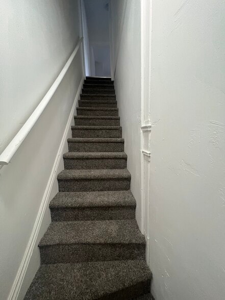 Steps going up apartment - 158 W Jackson St