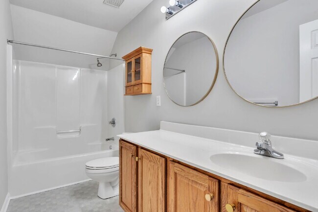 Building Photo - Beautifully Appointed 4BR Home Featuring a Screened Porch, Spacious Living Areas & Community Pool...