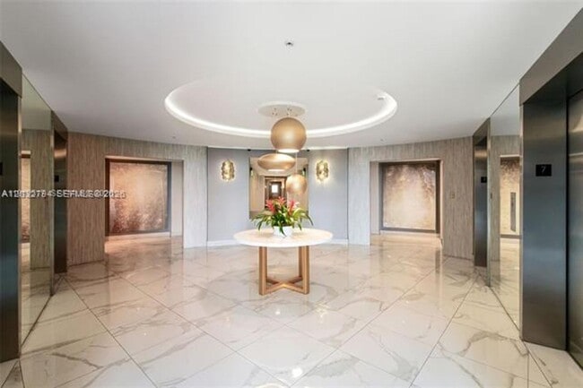 Building Photo - 10275 Collins Ave