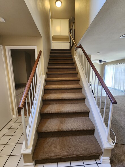 Stairs leading to 3 bedrooms - 630 W Palm Ave