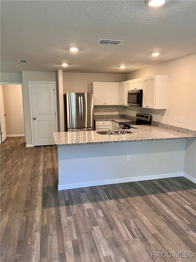 Building Photo - 6652 N Bedstrow Blvd