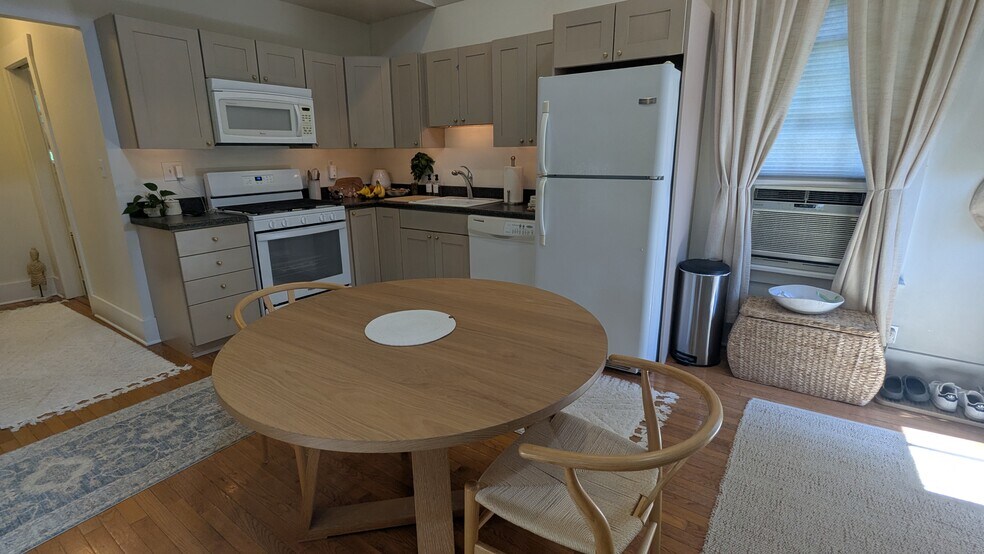 Eat in kitchen w/ brand new gas oven/stove, micro, dishwasher, farmhouse sink, plenty of storage! - 156 Henry St