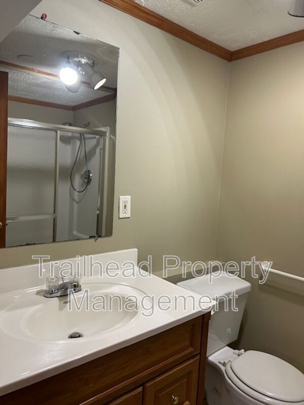Building Photo - 401 SW Stoney Brook Ln