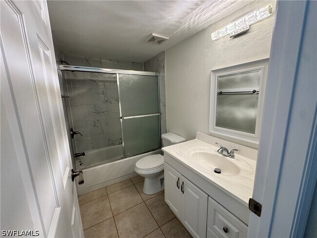 Building Photo - 12250 Tamiami Trl E