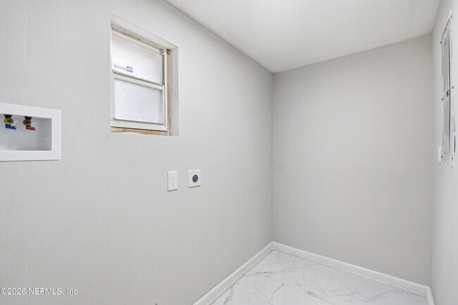 Building Photo - 7386 Dostie Dr E