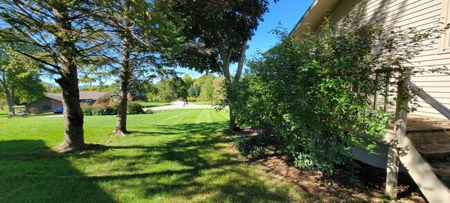 Building Photo - Beautiful home with peek a boo views of West Bay on Old Mission Peninsula