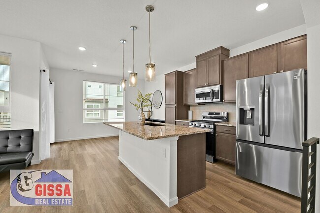Building Photo - 1.5 year old townhome with 3 bedrooms, 2 1/2 bathrooms, 2-car garage at Victory Ridge available NOW!