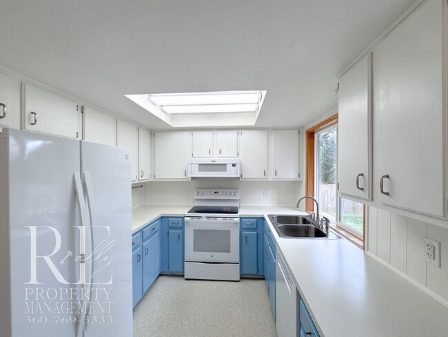 Building Photo - Bright & Spacious Single-Level Home with Dual Living Areas