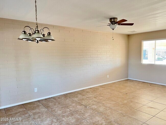 Building Photo - 12247 N Cherry Hills Dr W