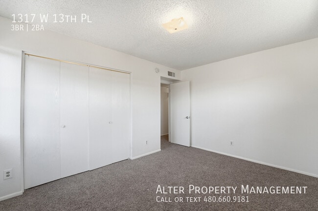 Building Photo - 1317 W 13th Pl