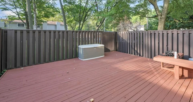 Outdoor patio/ play area exiting into a larger common play area - 2134 Wickham St