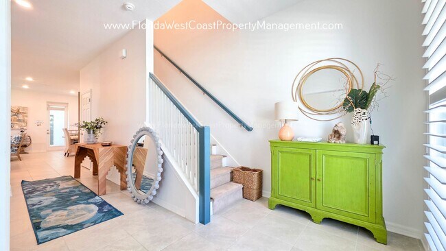 Building Photo - EXCEPTIONAL AND SPACIOUS FURNISHED TOWNHOME WITHIN WATERSIDE- NAUTIQUE!