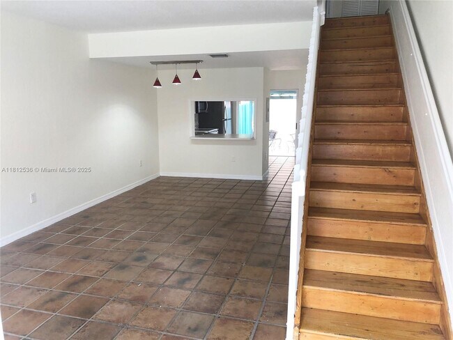 Building Photo - 9837 W Okeechobee Rd