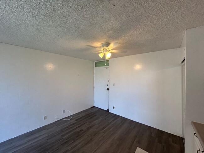 Building Photo - Upgraded studio available now in a secured...