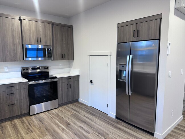 Building Photo - NEW 3 Bedroom near Vince Genna Stadium - Available 4/20