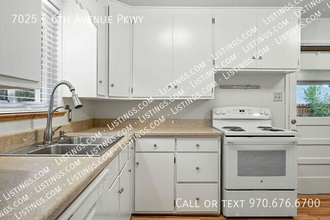 Building Photo - 7025 E 6th Ave