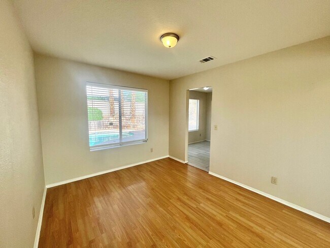 Building Photo - Gorgeous 4 Bedroom Home with Pool & Spa Located in The Lakes